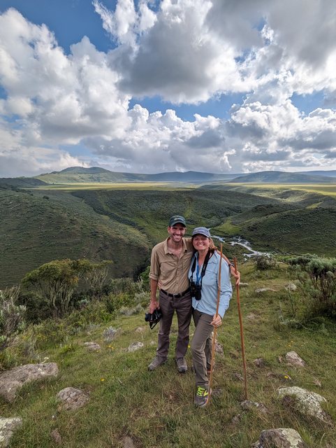 A happy couple smiling at Olmoti Crater on a luxury safari from The Highlands Camp at Ngorongoro Crater Tanzania