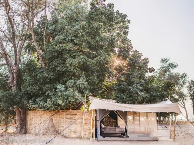 Exterior view of a canvas safari tent at Chula Island Camp, on the Lower Zambezi in Zambia