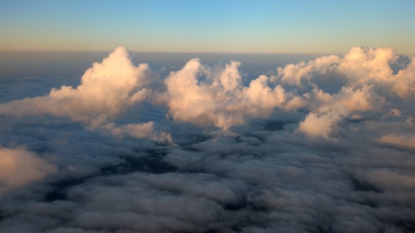 clouds and horizon seen from a flight to Patagonia