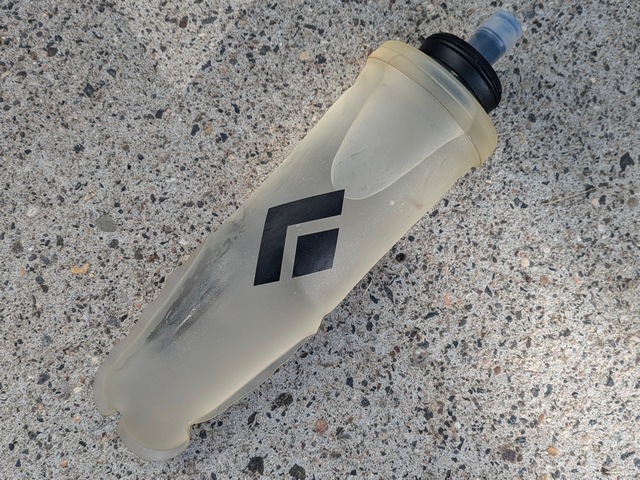 collapsible water bottle filled with water