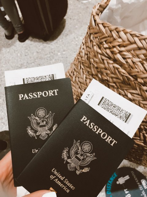 two passports with boarding passes