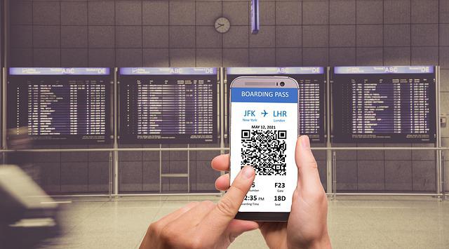 digital boarding pass for flight on a phone screen