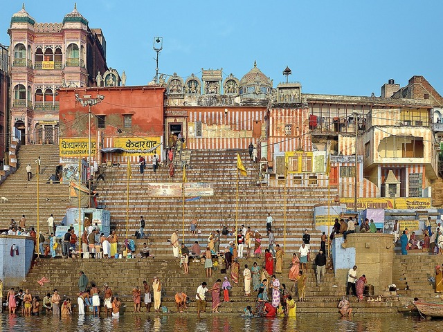 People bustling about the ghats at Varanasi India